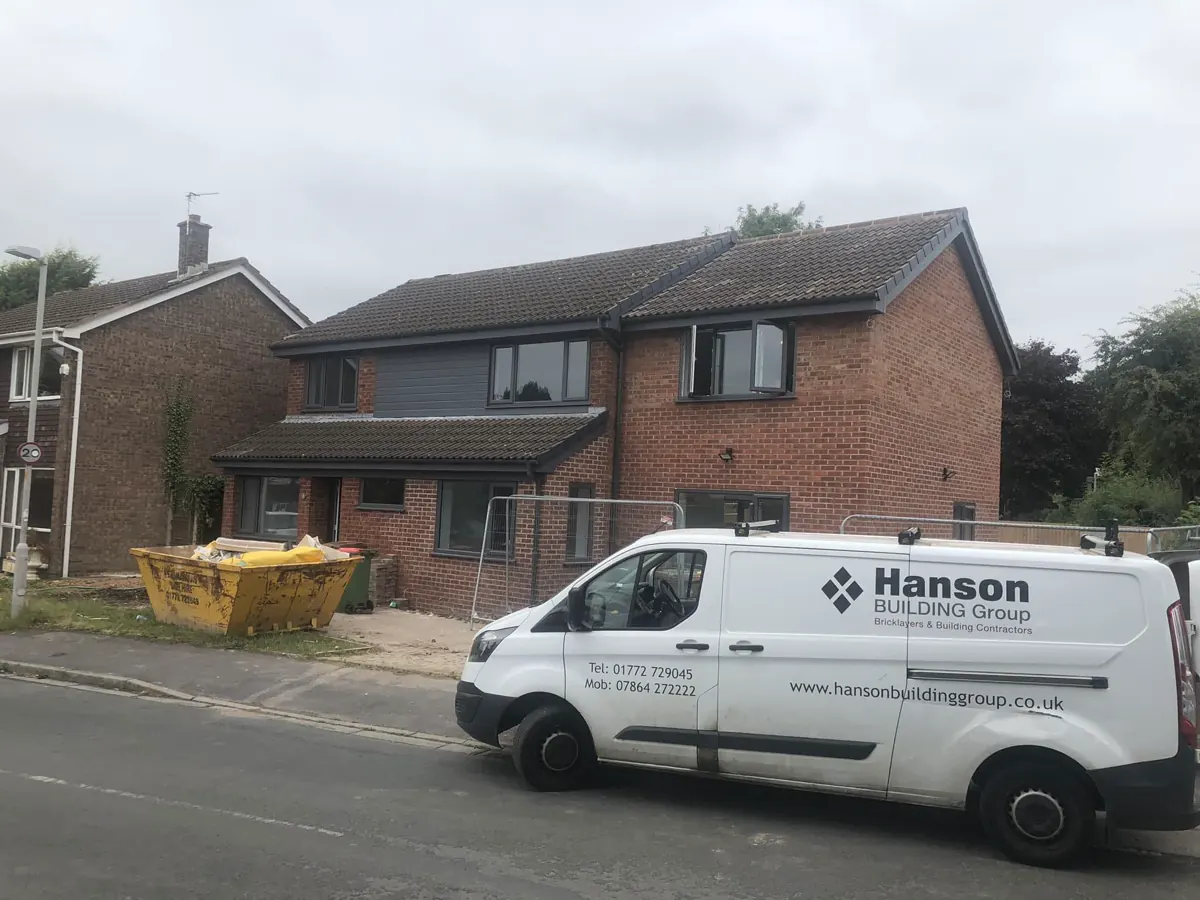 Building work in progress with masonry and site preparation